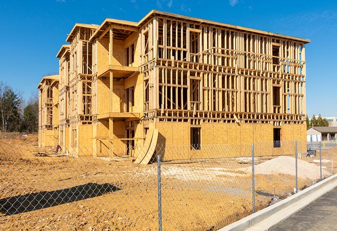 a snapshot of temporary chain link fences protecting a large construction project from unauthorized access in Lauderdale Lakes, FL